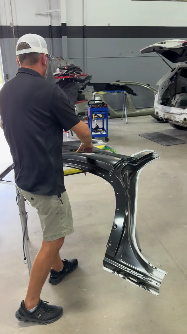 Bringing a replacement panel to the car