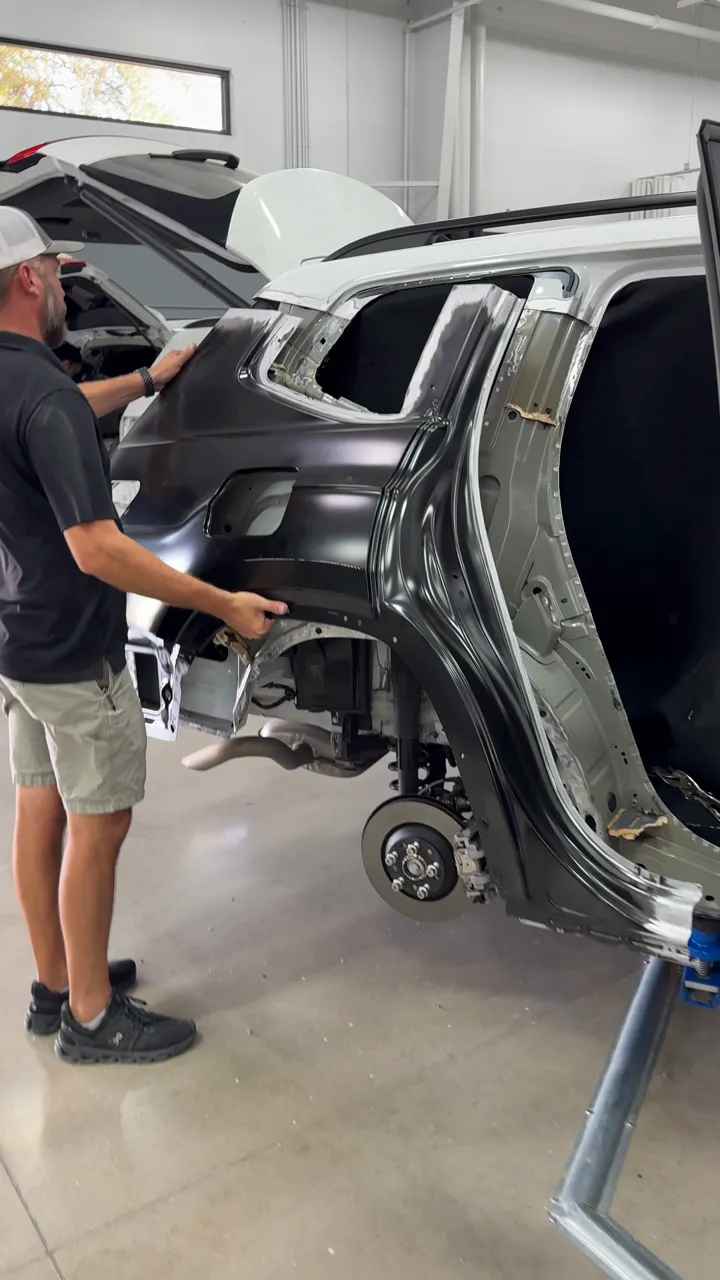 Fitting a quarter panel by hand